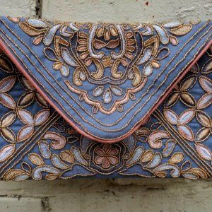 Francesca's Embroidered Blue Envelope Bag